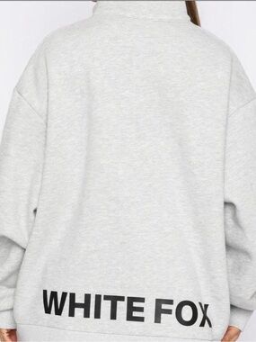 White Fox quarter zip sweater Size S/M fits up to a Large